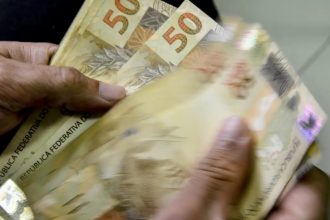 Caixa começa a pagar Bolsa Família de maio