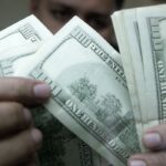 Dólar aproxima-se de R$ 5,17, com notícias do exterior e eleições